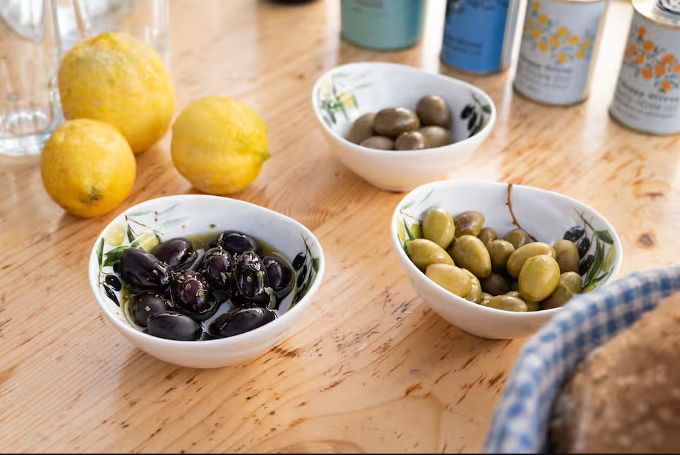 Bowls of olives and lemons
